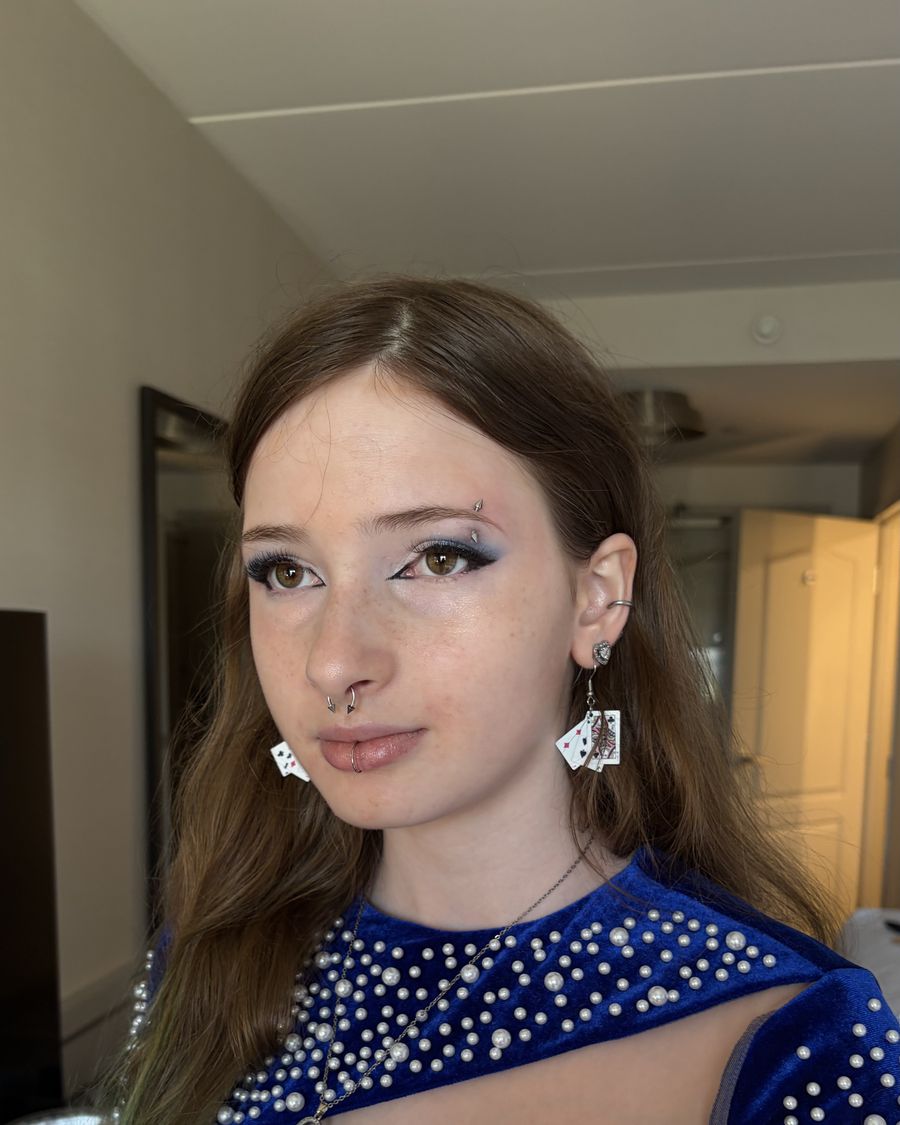 Full glam for an evening event, navy beaded gown