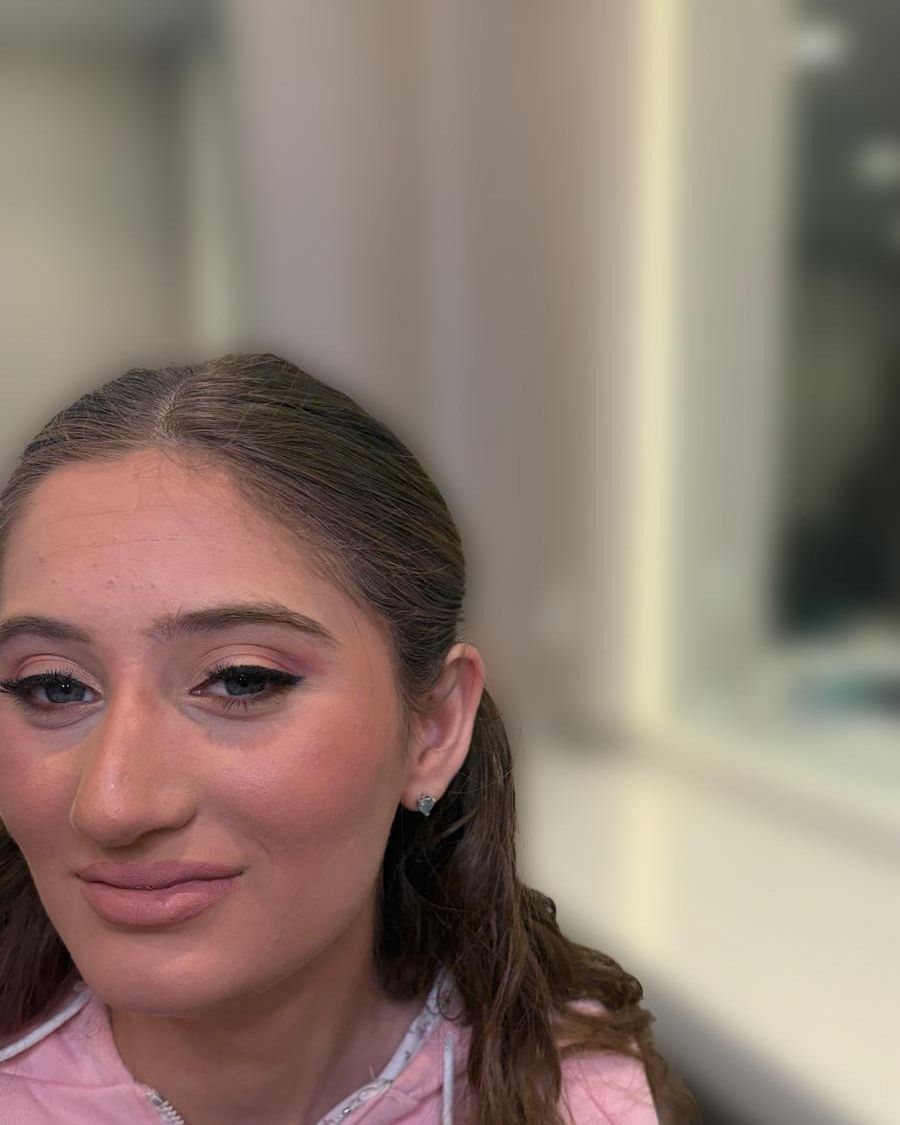 Soft everyday makeup, hair in a loose braid
